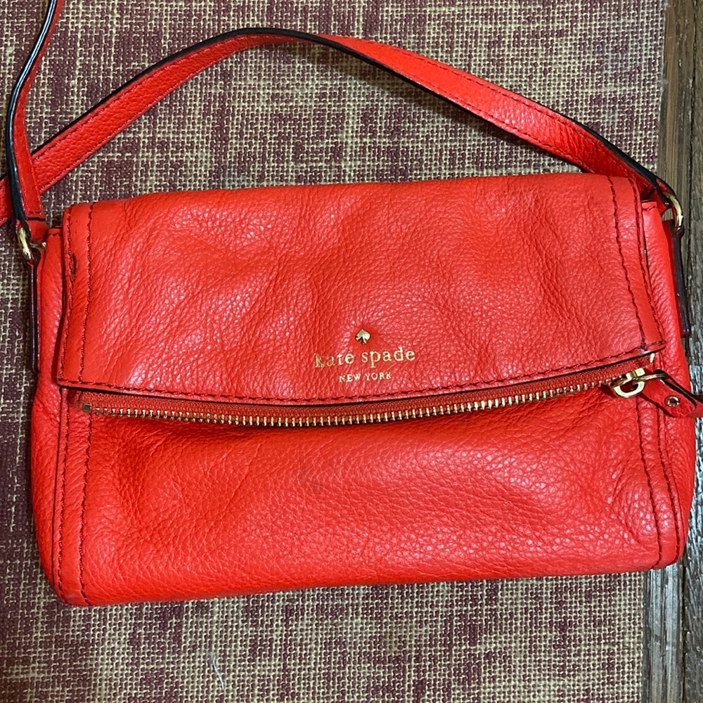 Bright red Kate spade purse